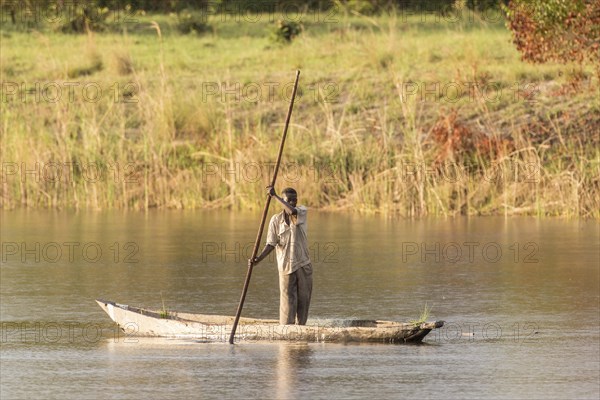 Fisherman on small lake near Kalabo