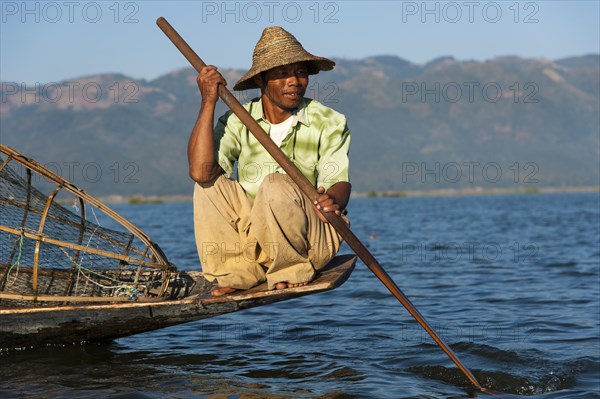 Fishermen with a traditional basket