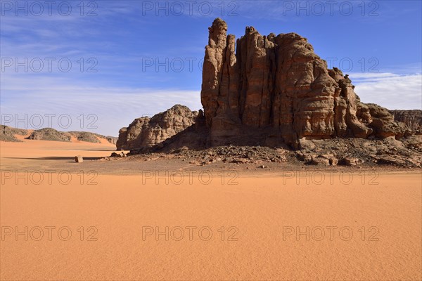 Rocks and sand dunes at Tin Merzouga