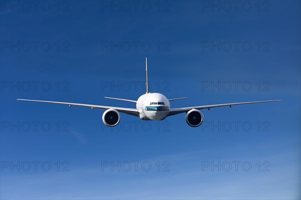 Cathay Pacific Boeing 777-367 ER in flight