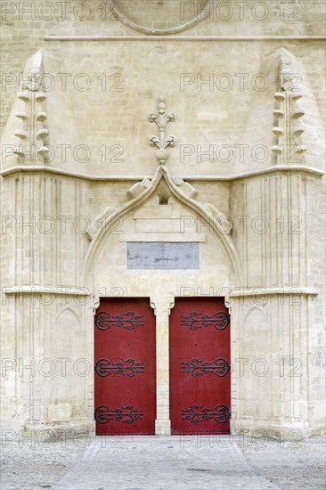 Front portal doors of Montpellier Cathedral or Cathedrale Saint-Pierre de Montpellier