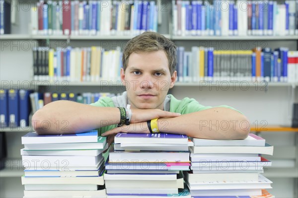 Student studying in the departmental library of the University of Hohenheim in Schloss Hohenheim Palace