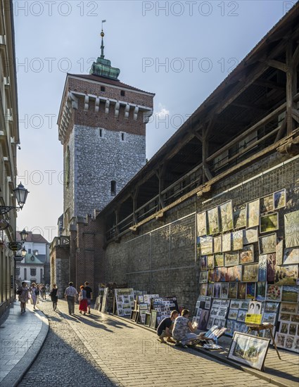 Artist selling his paintings at the old city walls