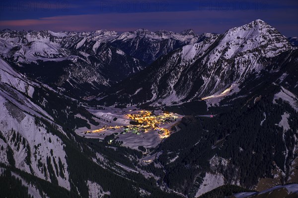 Berwang with the peaks of the Lechtal Alps in the evening