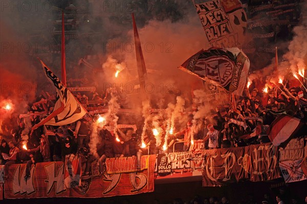 Cologne fans burning flares