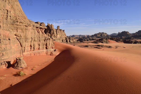 Eroded sandstone rocks and sand dunes at the Cirque