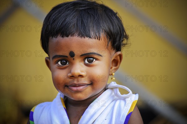 Smiling girl with a bindi