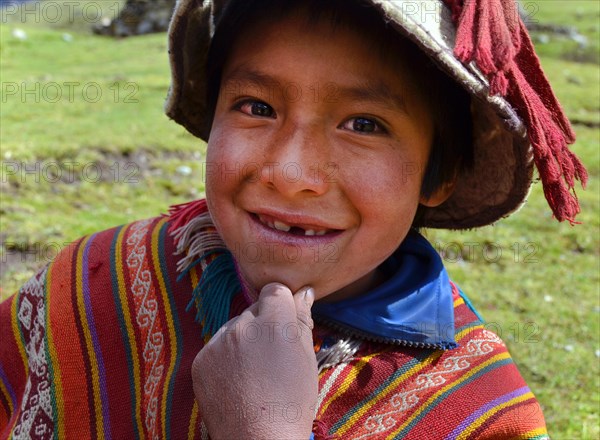 Young boy wearing traditional costume