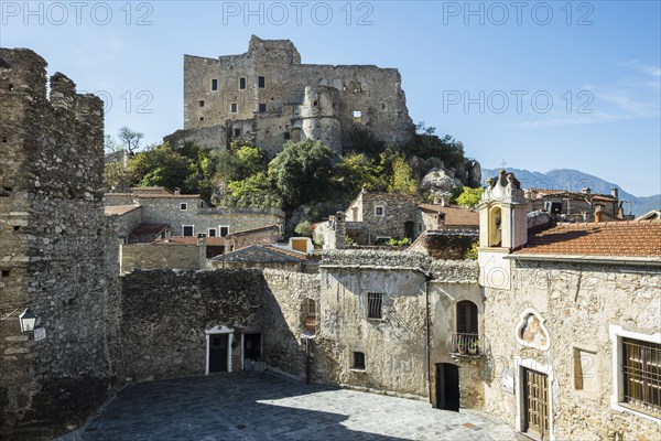 Medieval village with a castle in the mountains