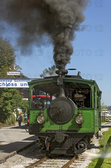 Steam locomotive with black smoke