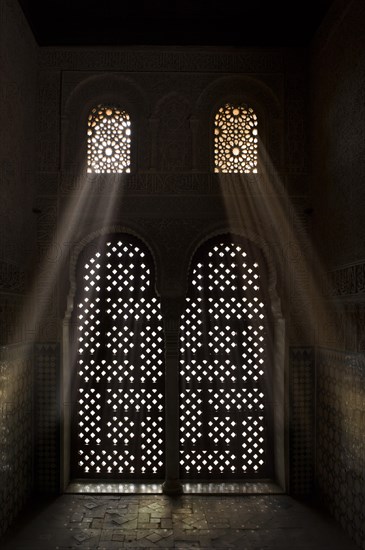 Moorish relief decoration on window arches in the Nazrid Palace