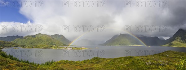 View from a lookout towards Sildpollnes with a rainbow