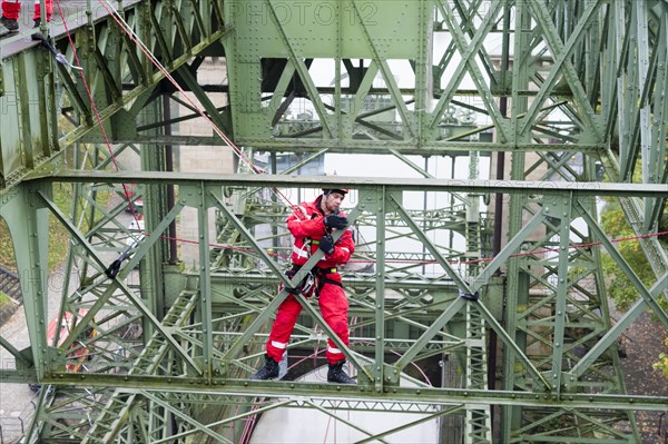 Firefighter practicing rescue from heights on the old Henrichenburg boat lift