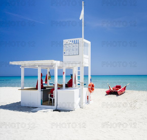 Lifeguard tower and rescue boat on the beach of Simius