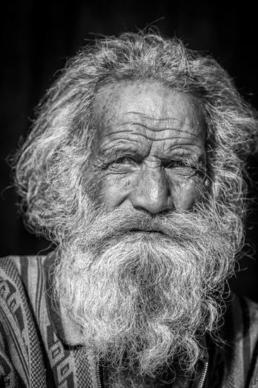 Black and white portrait of an elderly Sadhu