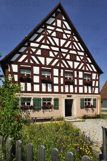 Half-timbered farmhouse on stone base