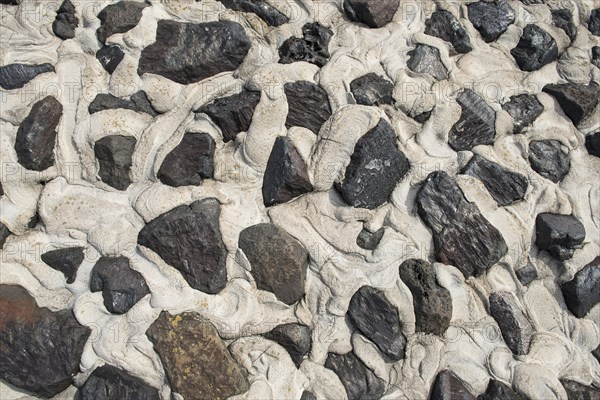 Rocks and concrete on the western embankment