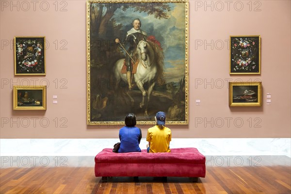 Two teenagers in front of a painting in the Museo de Bellas Artes de Valencia