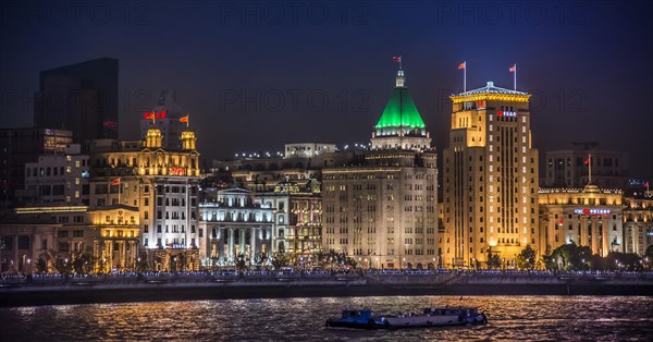 The Bund at night with the Bank of China building and the Fairmont Peace Hotel