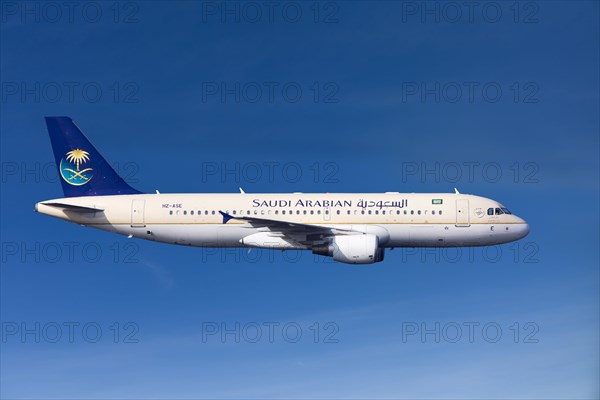 Saudi Arabian Airlines Airbus A320-214 in flight