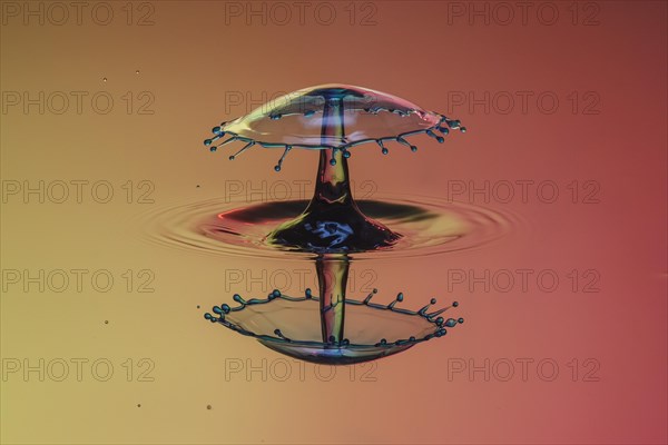 Three drops collide