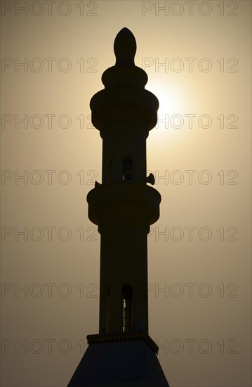Silhouette of a minaret of a mosque