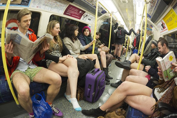 Participants of the 'No Trousers Tube Ride'-Flashmob on the London Underground