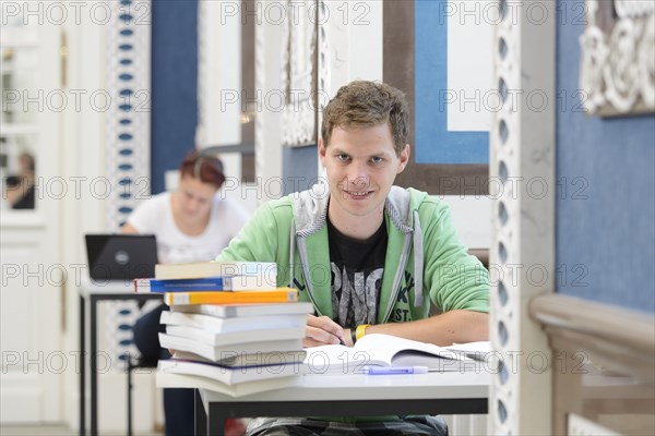 Students studying in the departmental library of the University of Hohenheim in Schloss Hohenheim Palace