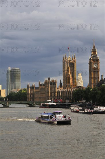 View from Hungerford Bridge on the Houses of Parliament and Elizabeth Tower clock tower