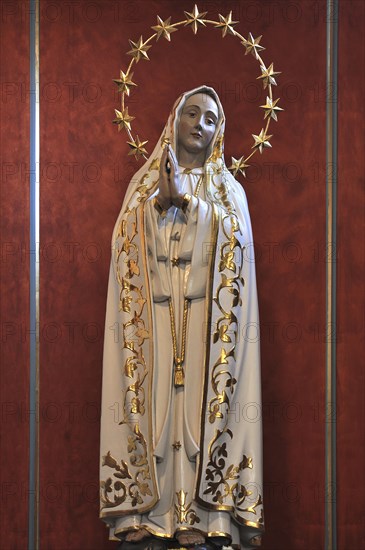 Sculpture of the Virgin Mary with a circle of stars