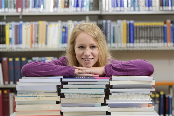 Student studying in the departmental library of the University of Hohenheim in Schloss Hohenheim Palace