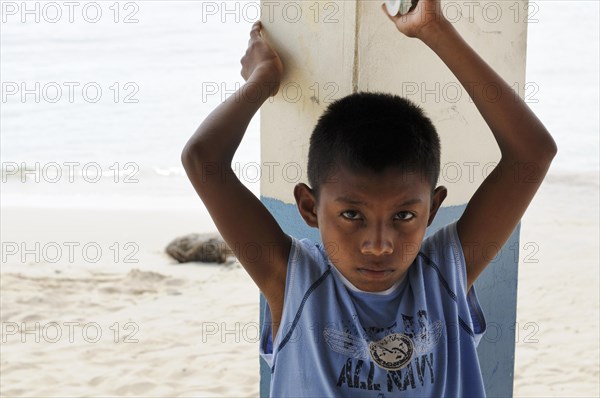 Kuna Indian boy in a Kuna Indian village