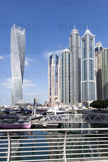 Cayan Tower and skyscrapers with marina