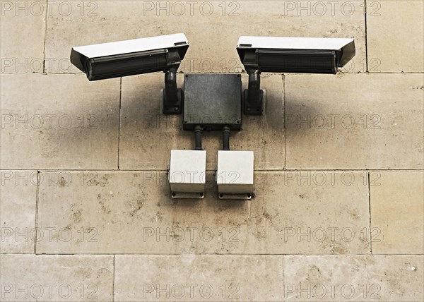 CCTV security cameras mounted on a wall