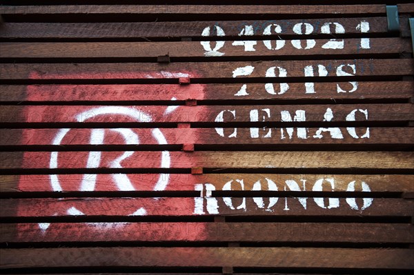 Labeled tropical timber on a truck