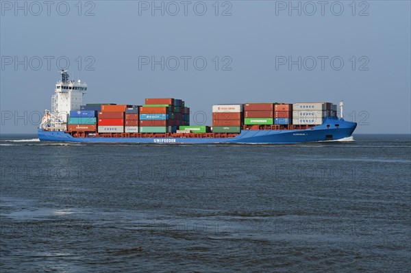 Container ship 'Aldebaran J' on the Elbe River