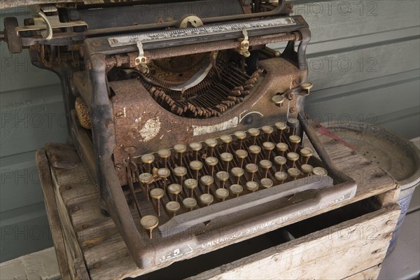 An old rusted Underwood manual typewriter