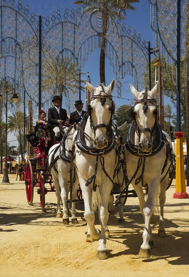 Decorated horses and dressed up coachmen at the Feria del Caballo Horse Fair