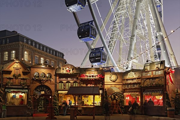 Christmas market with a ferris wheel on Burgplatz square
