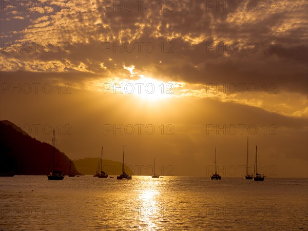 Sailing yachts at twilight near Rodney Bay