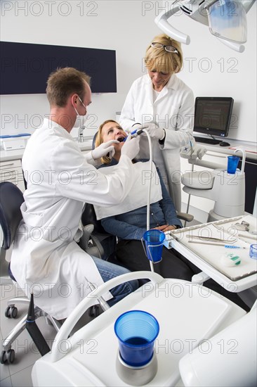 Woman receiving treatment at the dentist