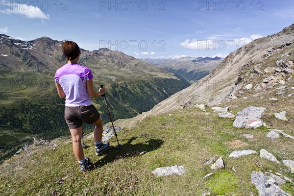 Female climber during the ascent of Mt Schmied at Langtaufers in the Alta Val Venosta