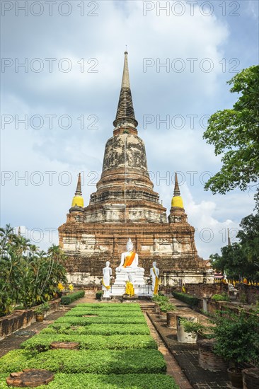 Buddha statues in front of the stupa at Wat Yai Chai Mongkhon