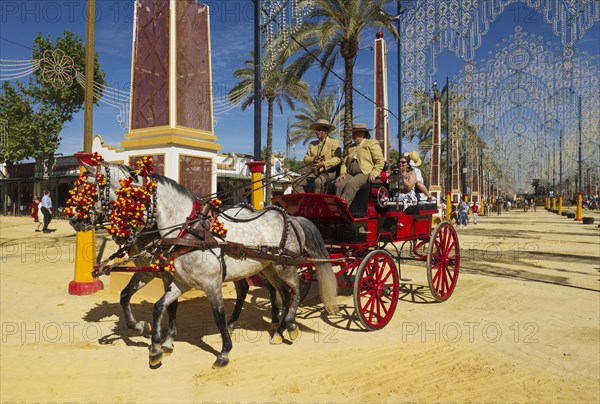 Decorated horses and dressed up coachmen at the Feria del Caballo Horse Fair