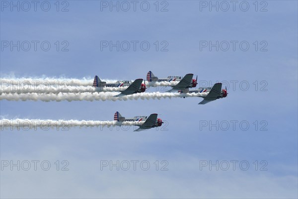 Geico Skytypers T-6 Aerobatic Team performs at Milwaukee Air Show