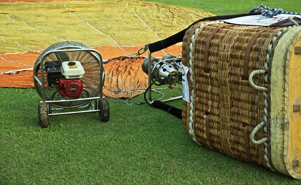 Hot air balloon lying on the ground