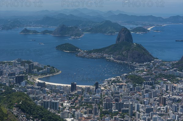 Outlook from the Christ the Redeemer statue over Rio de Janeiro and the Sugar Loaf