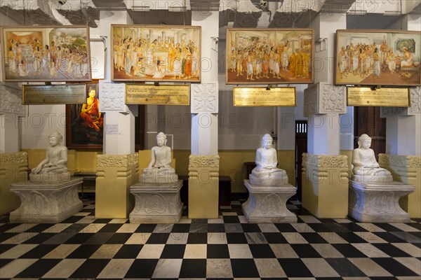 Buddha statues in the Temple of the Sacred Tooth Relic