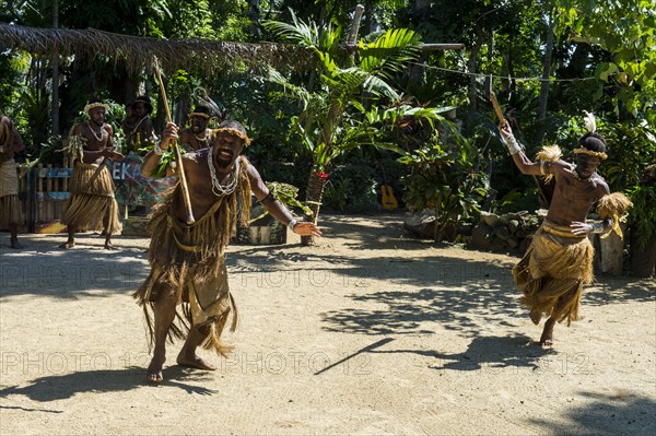 Men practising a traditional war ceremony