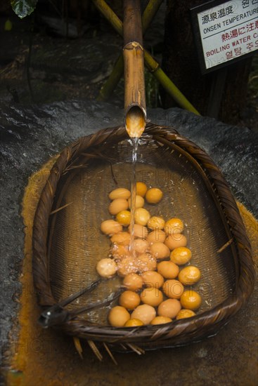 Eggs being boiled in hot water